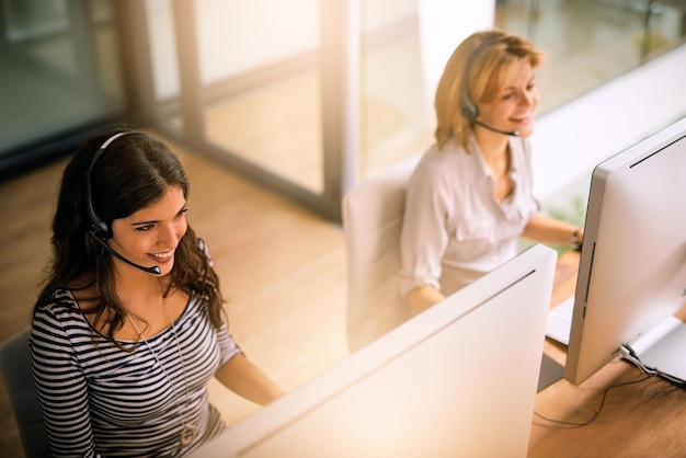 call center computer contact us with business people office customer support virtual consulting sales help desk policy information claims inquiry with women insurance company
